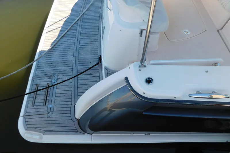  Yacht Photos Pics 2009 Tiara Yachts 4300 Sovran, deck view with teak flooring and seating area.