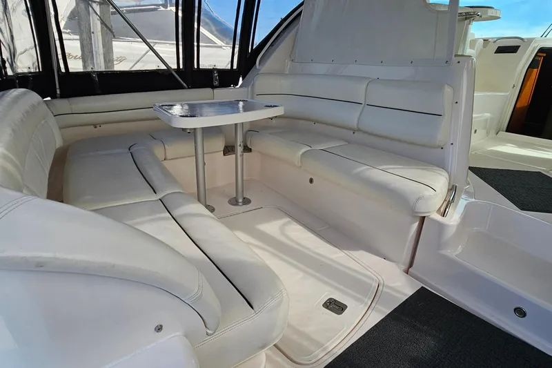  Yacht Photos Pics Luxurious seating area on 2009 Tiara Yachts 4300 Sovran with elegant white upholstery.