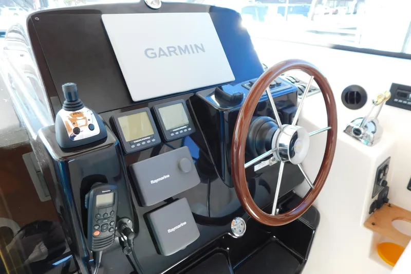  Yacht Photos Pics Helm of 2009 Tiara Yachts 4300 Sovran with Garmin and Raymarine equipment.