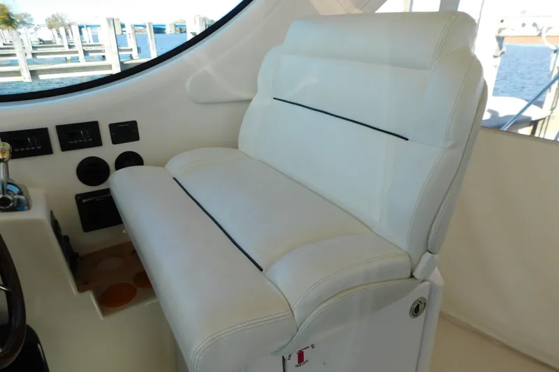  Yacht Photos Pics Luxurious white seating in 2009 Tiara Yachts 4300 Sovran cockpit area.