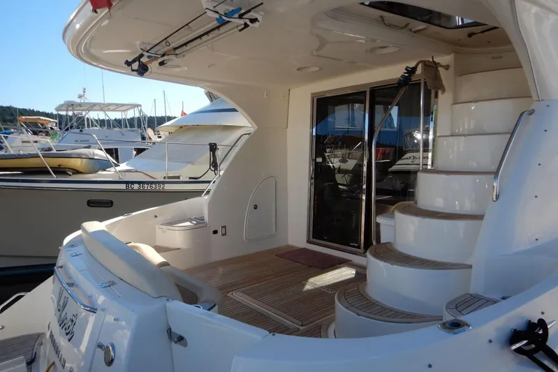  Yacht Photos Pics Aft Cockpit with SS Entry Doors and Moulded Steps up to Helm Deck