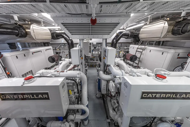 Rena Yacht Photos Pics Engine room of 1989 NQEA Motor Yacht with Caterpillar engines and modern equipment.