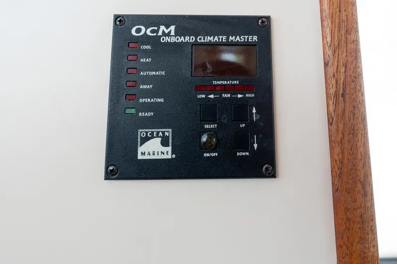 Cinnamon Girl Yacht Photos Pics Onboard climate control panel on a 2000 Nordic Tug 32 boat.