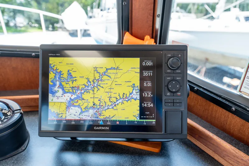 Cinnamon Girl Yacht Photos Pics Garmin GPS display on 2000 Nordic Tug 32 boat, showing detailed nautical map.
