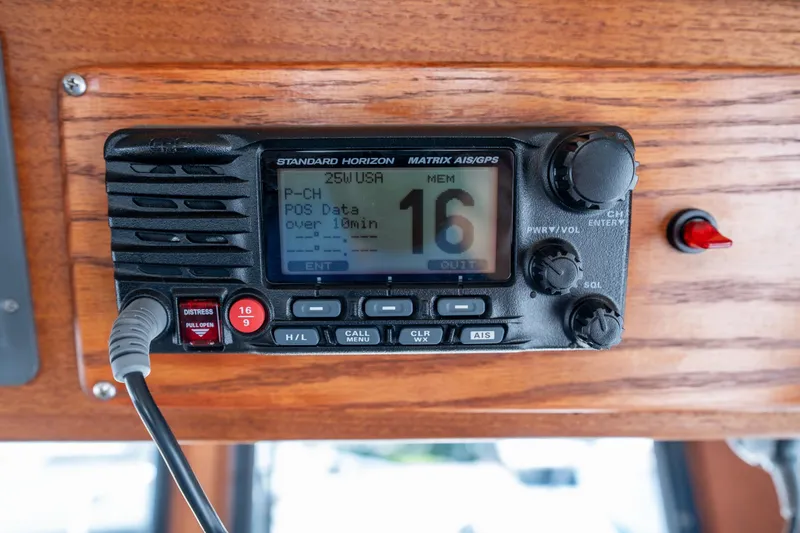 Cinnamon Girl Yacht Photos Pics Standard Horizon marine radio on 2000 Nordic Tug 32 boat dashboard.