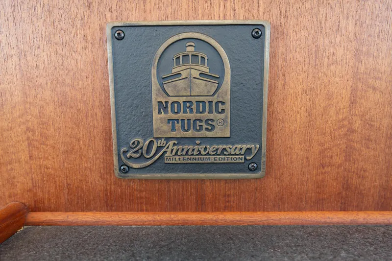 Cinnamon Girl Yacht Photos Pics Plaque on Nordic Tug 32, 20th Anniversary Millennium Edition, 2000 model.