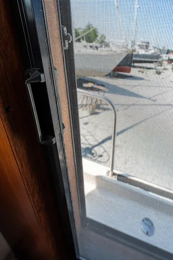 Cinnamon Girl Yacht Photos Pics View through Nordic Tug 32 window screen, showcasing exterior details, 2000 model.