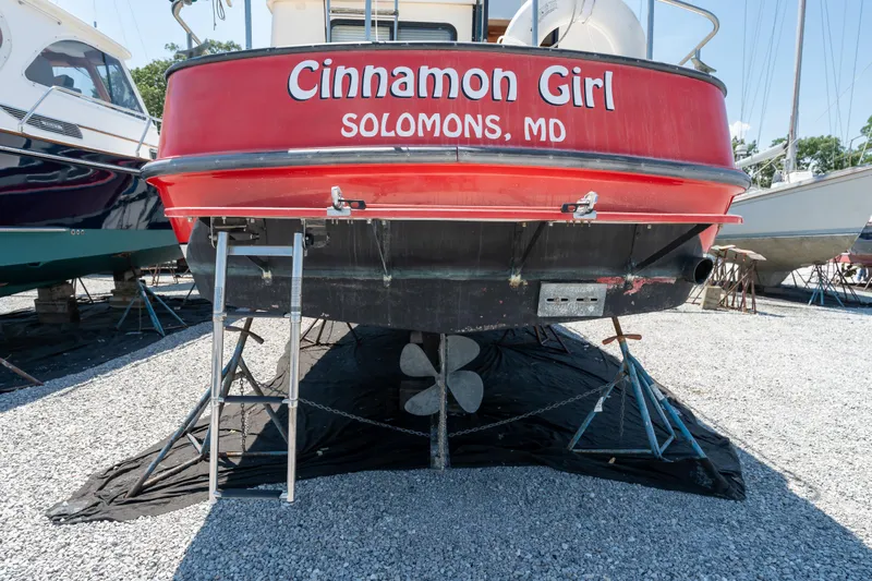 Cinnamon Girl Yacht Photos Pics Nordic Tug 32 boat "Cinnamon Girl" on dry dock, Solomons, MD, rear view.