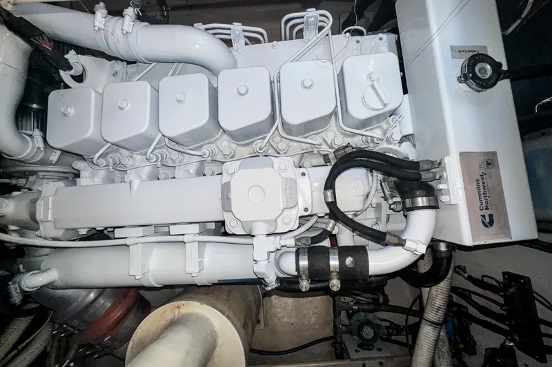 Cinnamon Girl Yacht Photos Pics Engine of a 2000 Nordic Tug 32 boat, featuring Cummins components.