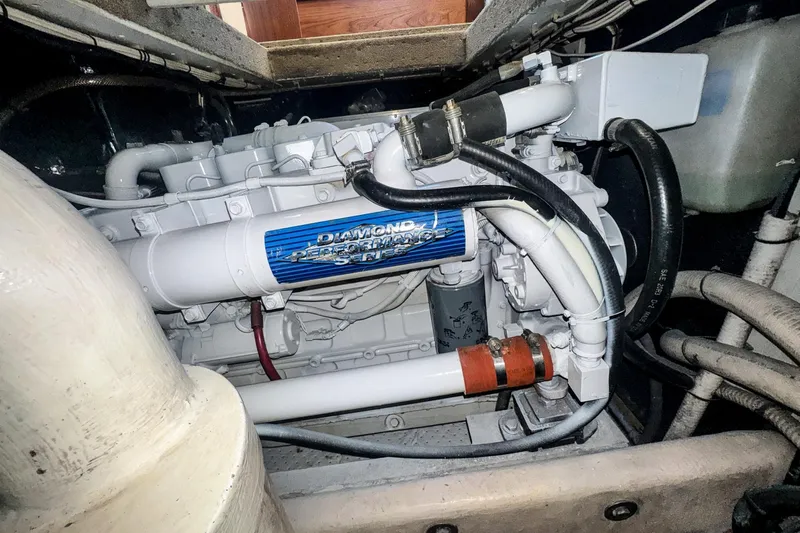 Cinnamon Girl Yacht Photos Pics Engine compartment of a 2000 Nordic Tug 32, featuring a Diamond Performance Series engine.