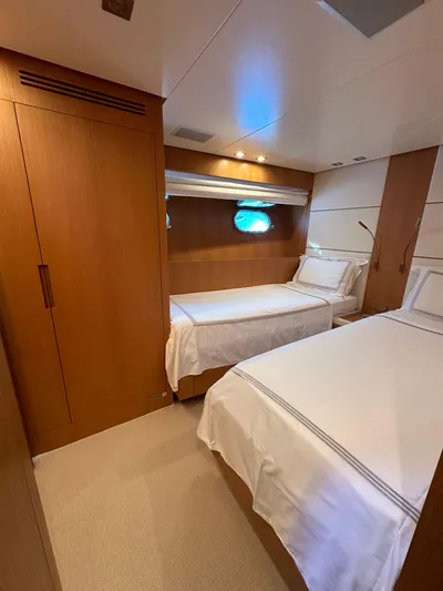  Yacht Photos Pics Luxurious cabin interior of 2010 Sanlorenzo SL82 yacht with twin beds.