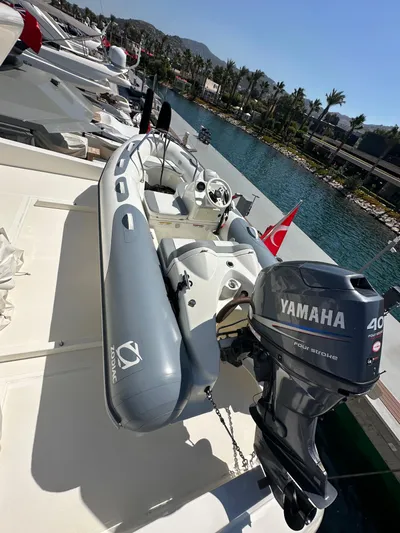  Yacht Photos Pics Sanlorenzo SL82 yacht with Yamaha motorboat, docked by a scenic waterfront, 2010 model.