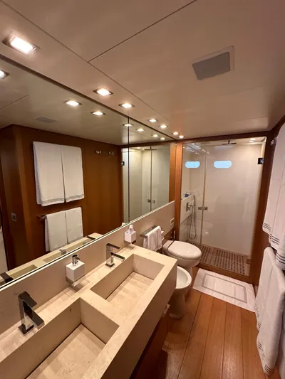  Yacht Photos Pics Luxurious bathroom on 2010 Sanlorenzo SL82 yacht with dual sinks and glass shower.