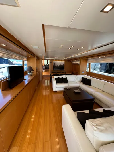  Yacht Photos Pics Luxurious interior of 2010 Sanlorenzo SL82 yacht with modern furnishings and wooden flooring.