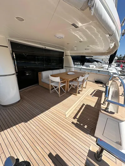  Yacht Photos Pics Luxury Sanlorenzo SL82 yacht deck with seating area, wooden flooring, and modern design, 2010 model.