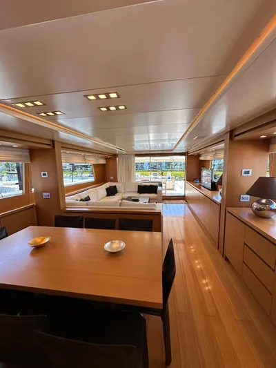  Yacht Photos Pics Luxurious interior of 2010 Sanlorenzo SL82 yacht with modern furnishings and ample natural light.