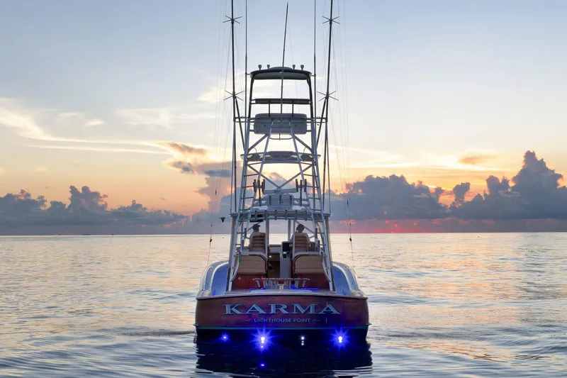 Karma Yacht Photos Pics 2019 Winter Custom Yachts 46 Walkaround at sunset on calm ocean waters.