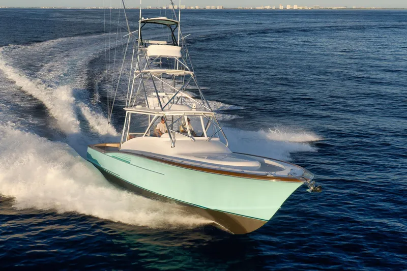 Karma Yacht Photos Pics 2019 Winter Custom Yachts 46 Walkaround cruising swiftly on open water.