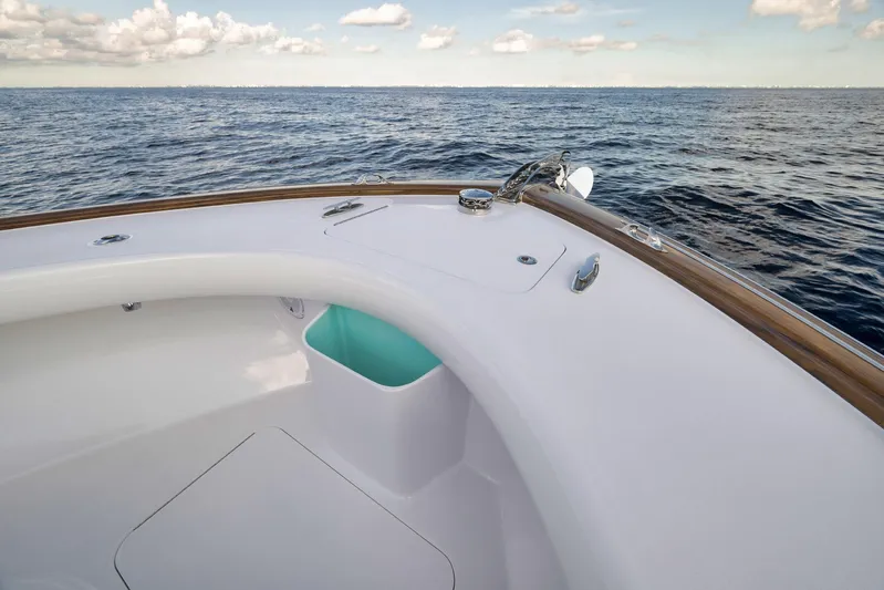 Karma Yacht Photos Pics 2019 Winter Custom Yachts 46 Walkaround, sleek deck design, ocean view, clear sky.
