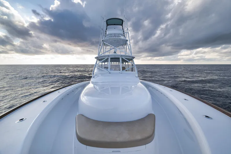 Karma Yacht Photos Pics 2019 Winter Custom Yachts 46 Walkaround on open sea under dramatic cloudy sky.