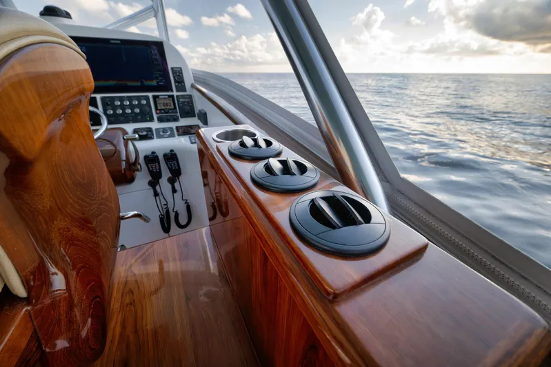 Karma Yacht Photos Pics Luxurious 2019 Winter Custom Yachts 46 Walkaround interior with ocean view and polished wood finish.