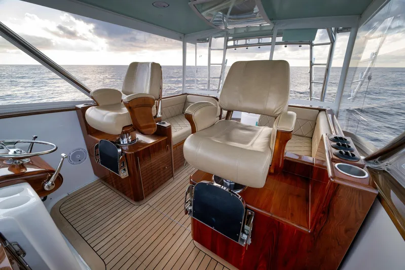 Karma Yacht Photos Pics Luxurious interior of 2019 Winter Custom Yachts 46 Walkaround, featuring plush seating and ocean view.