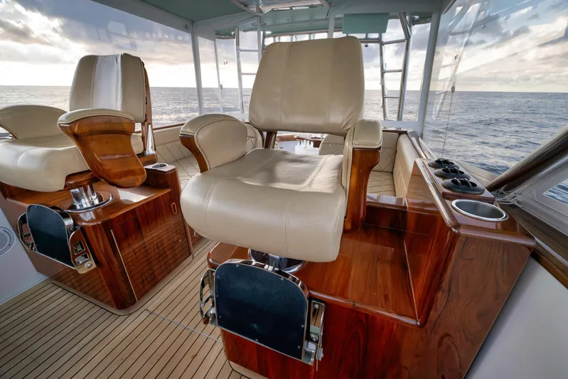 Karma Yacht Photos Pics Luxurious interior of 2019 Winter Custom Yachts 46 Walkaround with plush seating and ocean view.