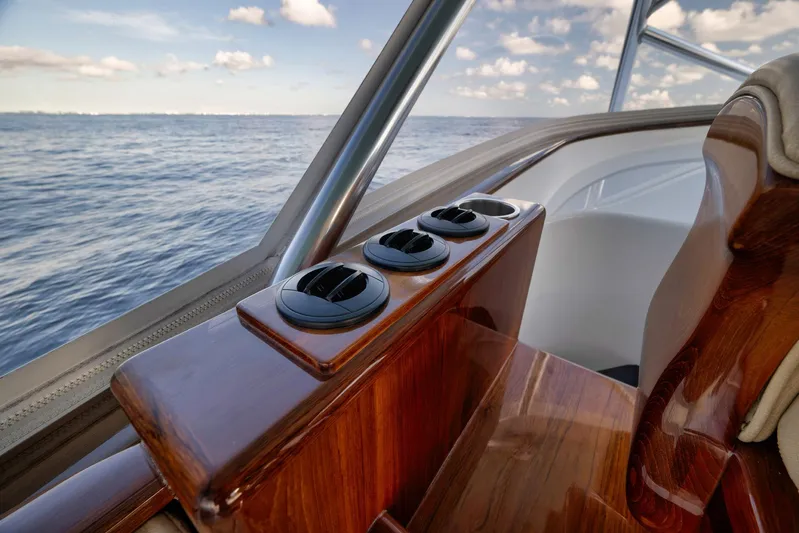 Karma Yacht Photos Pics 2019 Winter Custom Yachts 46 Walkaround interior with polished wood and ocean view.