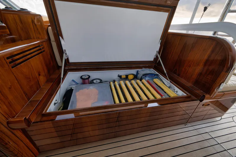 Karma Yacht Photos Pics Storage compartment on 2019 Winter Custom Yachts 46 Walkaround, featuring organized tools and equipment.