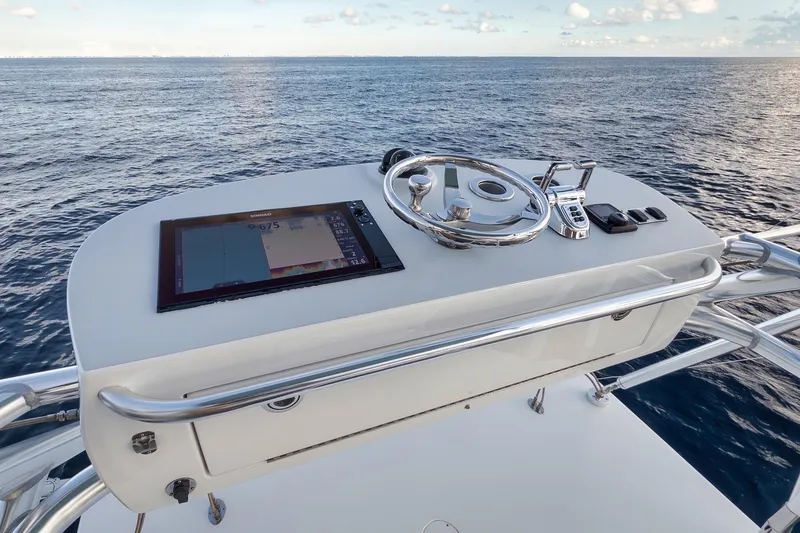 Karma Yacht Photos Pics 2019 Winter Custom Yachts 46 Walkaround helm with ocean view, featuring navigation controls.
