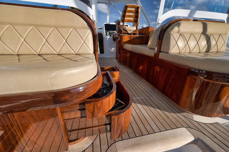 Karma Yacht Photos Pics Luxurious interior of 2019 Winter Custom Yachts 46 Walkaround with elegant wood and leather seating.