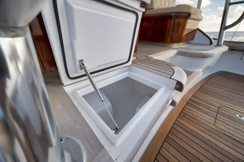 Karma Yacht Photos Pics Open storage compartment on 2019 Winter Custom Yachts 46 Walkaround deck.