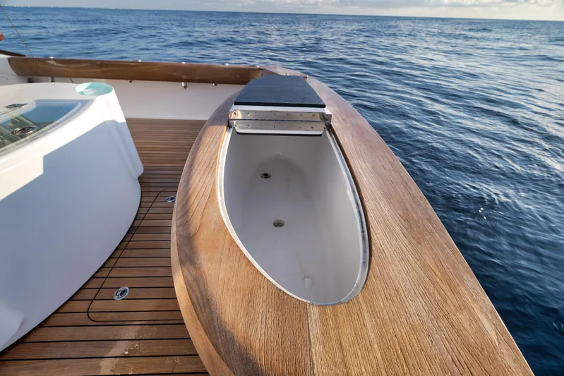 Karma Yacht Photos Pics 2019 Winter Custom Yachts 46 Walkaround deck with wooden finish and ocean view.