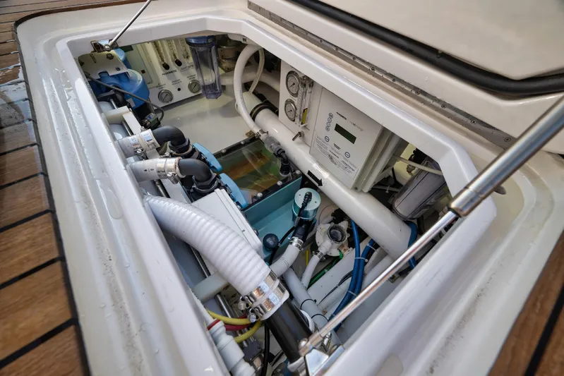 Karma Yacht Photos Pics Engine compartment of 2019 Winter Custom Yachts 46 Walkaround, showcasing intricate mechanical components.