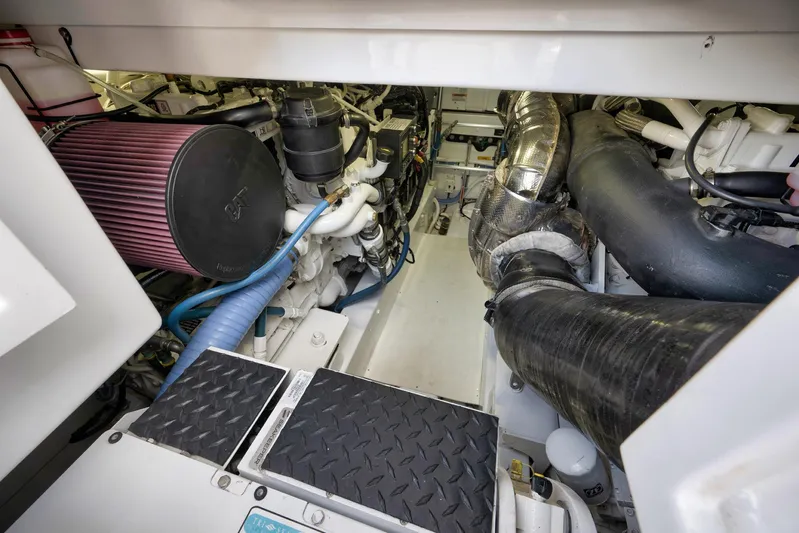 Karma Yacht Photos Pics Engine room of 2019 Winter Custom Yachts 46 Walkaround, showcasing mechanical components and piping.