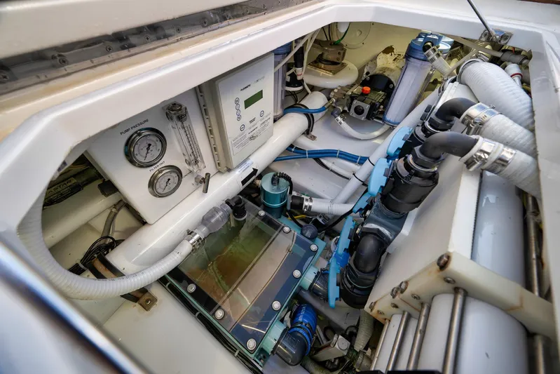 Karma Yacht Photos Pics Engine room of 2019 Winter Custom Yachts 46 Walkaround, showcasing complex mechanical systems.