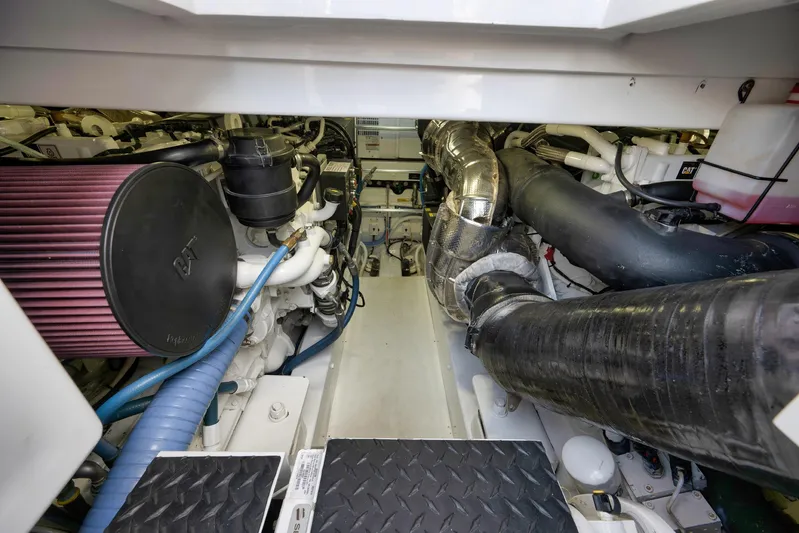 Karma Yacht Photos Pics Engine room of 2019 Winter Custom Yachts 46 Walkaround, showcasing complex machinery and components.