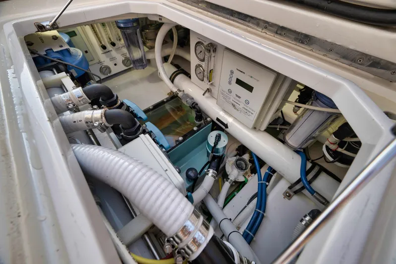 Karma Yacht Photos Pics Engine compartment of 2019 Winter Custom Yachts 46 Walkaround, showcasing complex machinery and wiring.