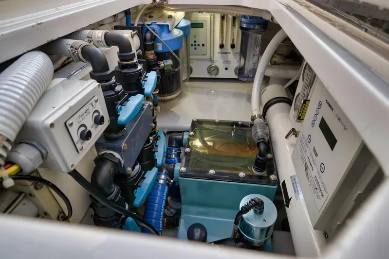 Karma Yacht Photos Pics Engine compartment of 2019 Winter Custom Yachts 46 Walkaround, showcasing complex machinery and components.