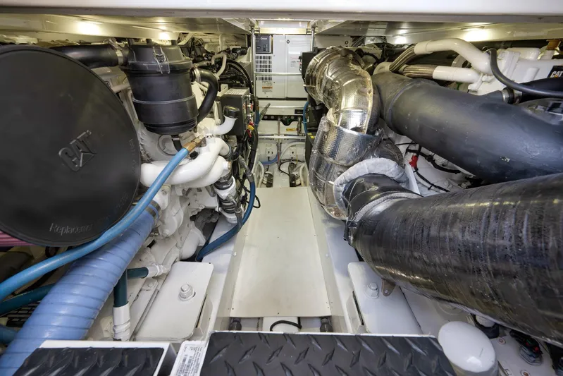 Karma Yacht Photos Pics Engine room of 2019 Winter Custom Yachts 46 Walkaround, showcasing mechanical components.