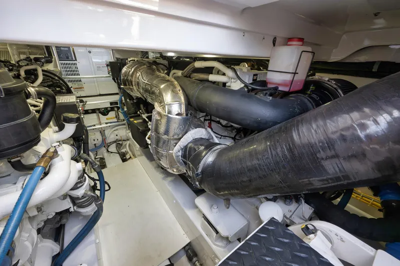 Karma Yacht Photos Pics Engine room of 2019 Winter Custom Yachts 46 Walkaround, showcasing complex machinery and components.