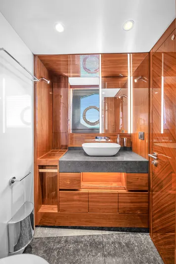 Atkun Yacht Photos Pics Luxurious bathroom in 2021 Sunseeker 68 Manhattan yacht with modern wood finishes.