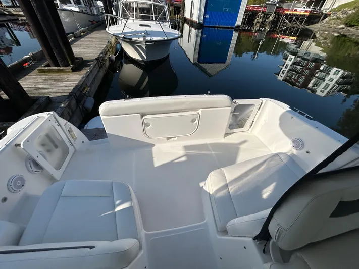  Yacht Photos Pics 2005 Tiara Yachts 3600 Sovran docked, showcasing spacious seating and sleek design.