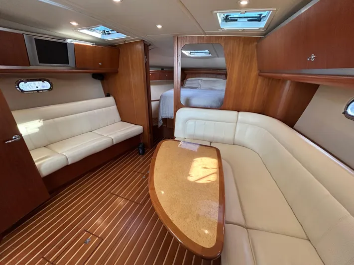  Yacht Photos Pics 2005 Tiara Yachts 3600 Sovran interior with elegant seating and wooden finishes.