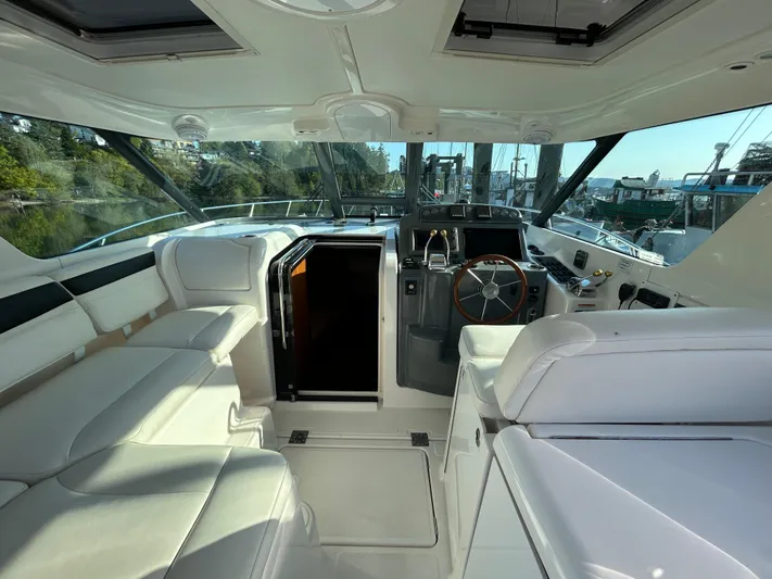  Yacht Photos Pics Interior of 2005 Tiara Yachts 3600 Sovran with luxurious seating and helm.
