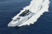 2008 Pershing 90 yacht cruising on open sea, creating a dynamic wake.