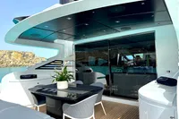 Luxurious 2008 Pershing 90 yacht deck with modern seating and ocean view.