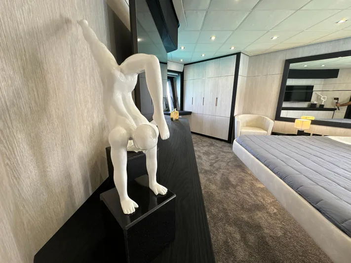 Thyke III Yacht Photos Pics Luxurious Pershing 90 yacht interior with modern sculpture and elegant bedroom design, 2008 model.