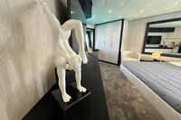 Luxurious Pershing 90 yacht interior with modern sculpture and elegant bedroom design, 2008 model.