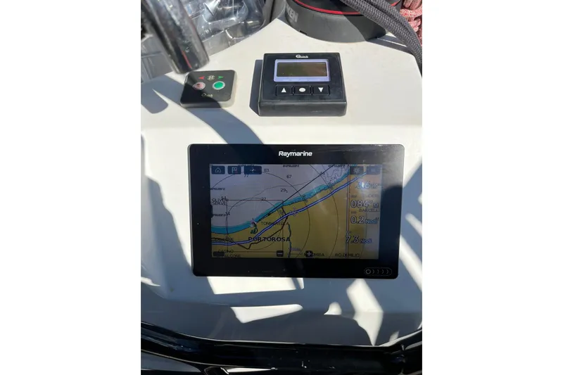  Yacht Photos Pics Navigation system on Jeanneau Sun Odyssey 410 yacht, featuring Raymarine display, 2021 model.